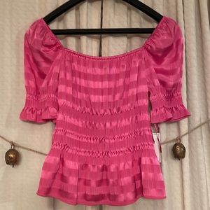 Pretty pink peplum top